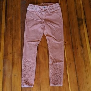 Pink jeans with detailing